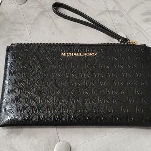 Michael Kors black embossed wristlet